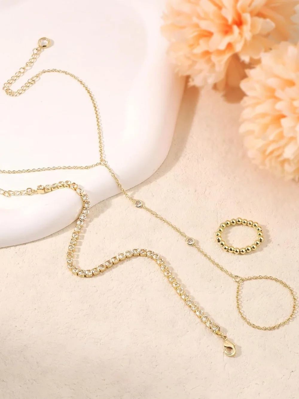 Anthropologie Gold Hand Chain with Clear Stones